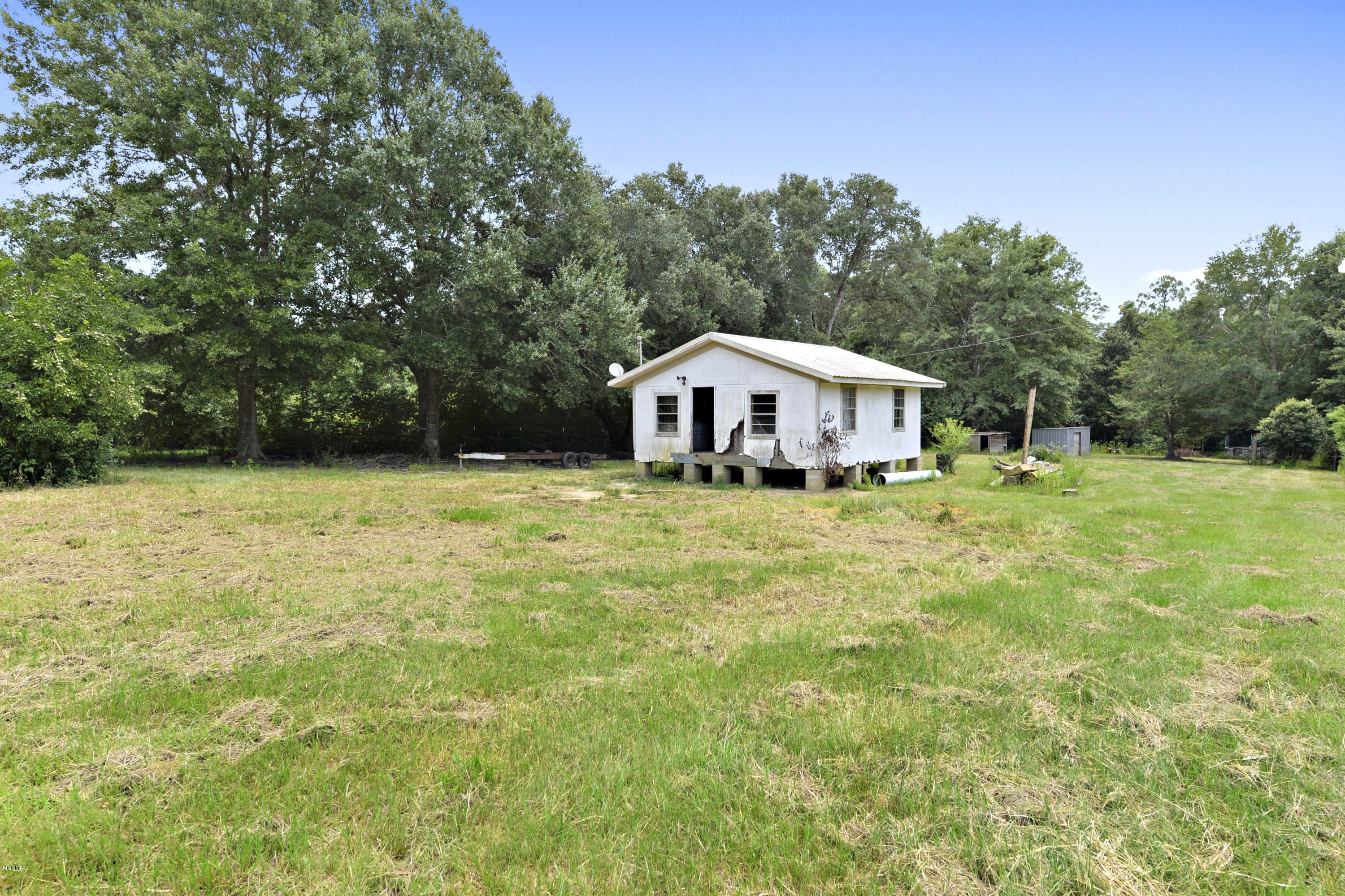 24025 Placide Road Pass Christian, MS 39571 - Photo 31 of 40 030