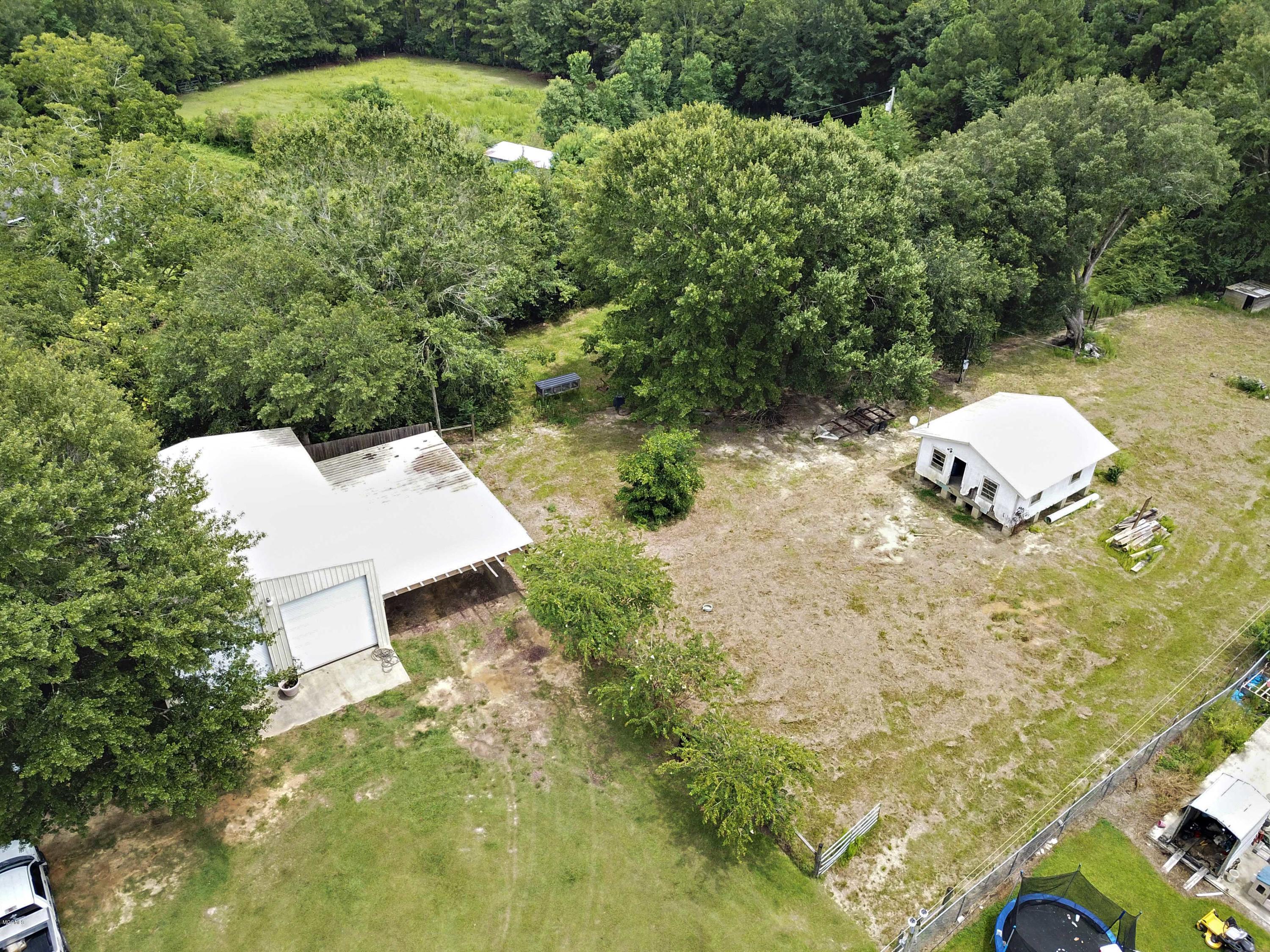 24025 Placide Road Pass Christian, MS 39571 - Photo 34 of 40 034