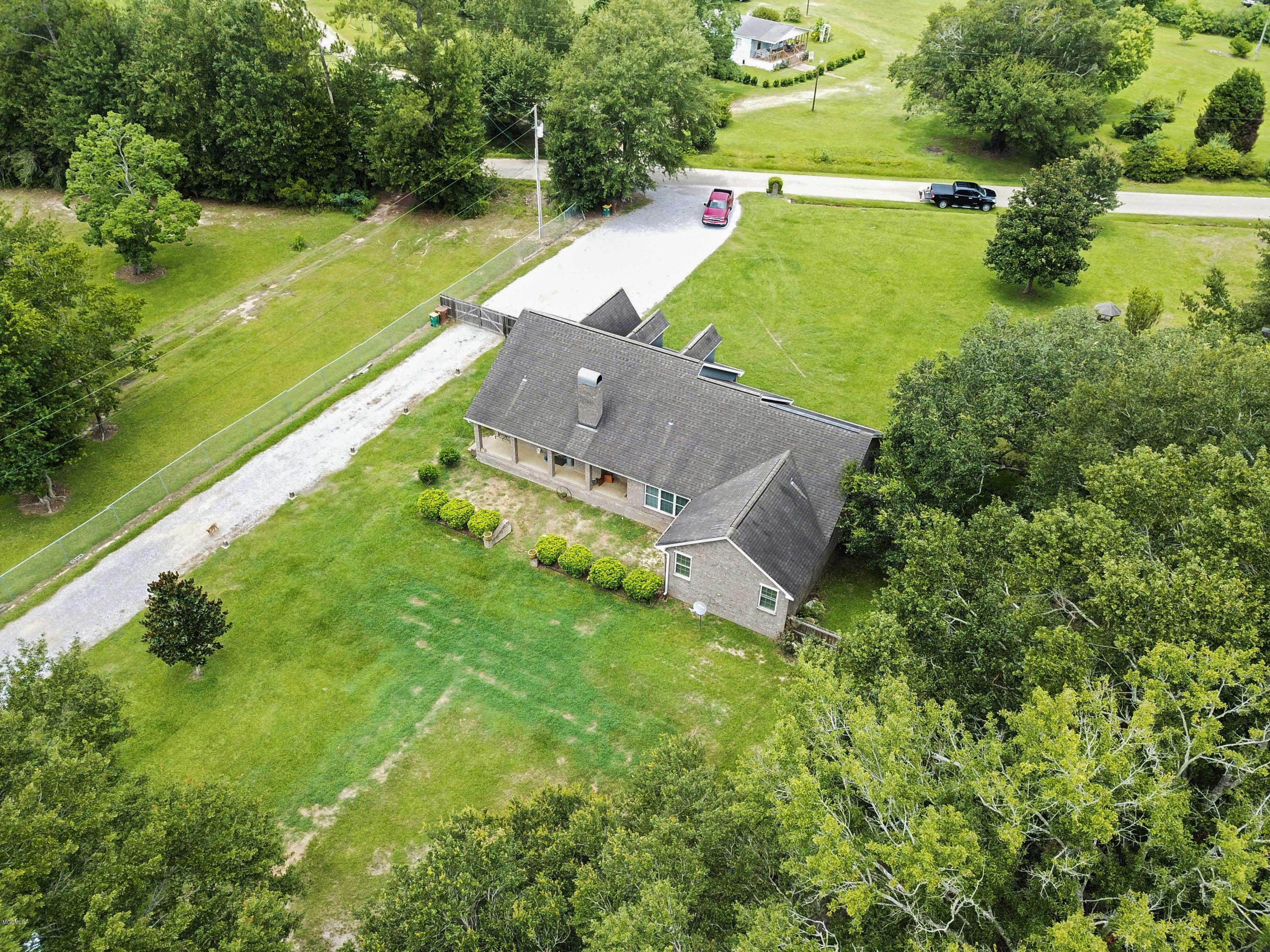 24025 Placide Road Pass Christian, MS 39571 - Photo 37 of 40 037