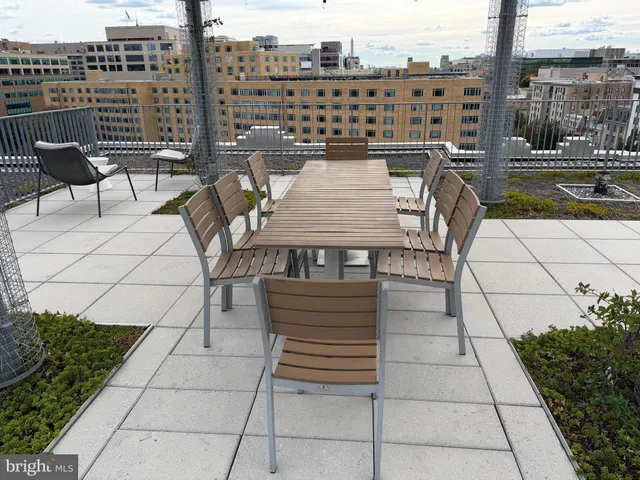 a view of a terrace with furniture and stove