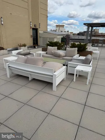 a view of a terrace with seating space