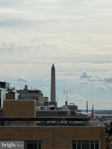 a view of a city with a lake