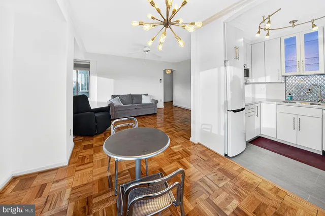 a bedroom with a bed and a table