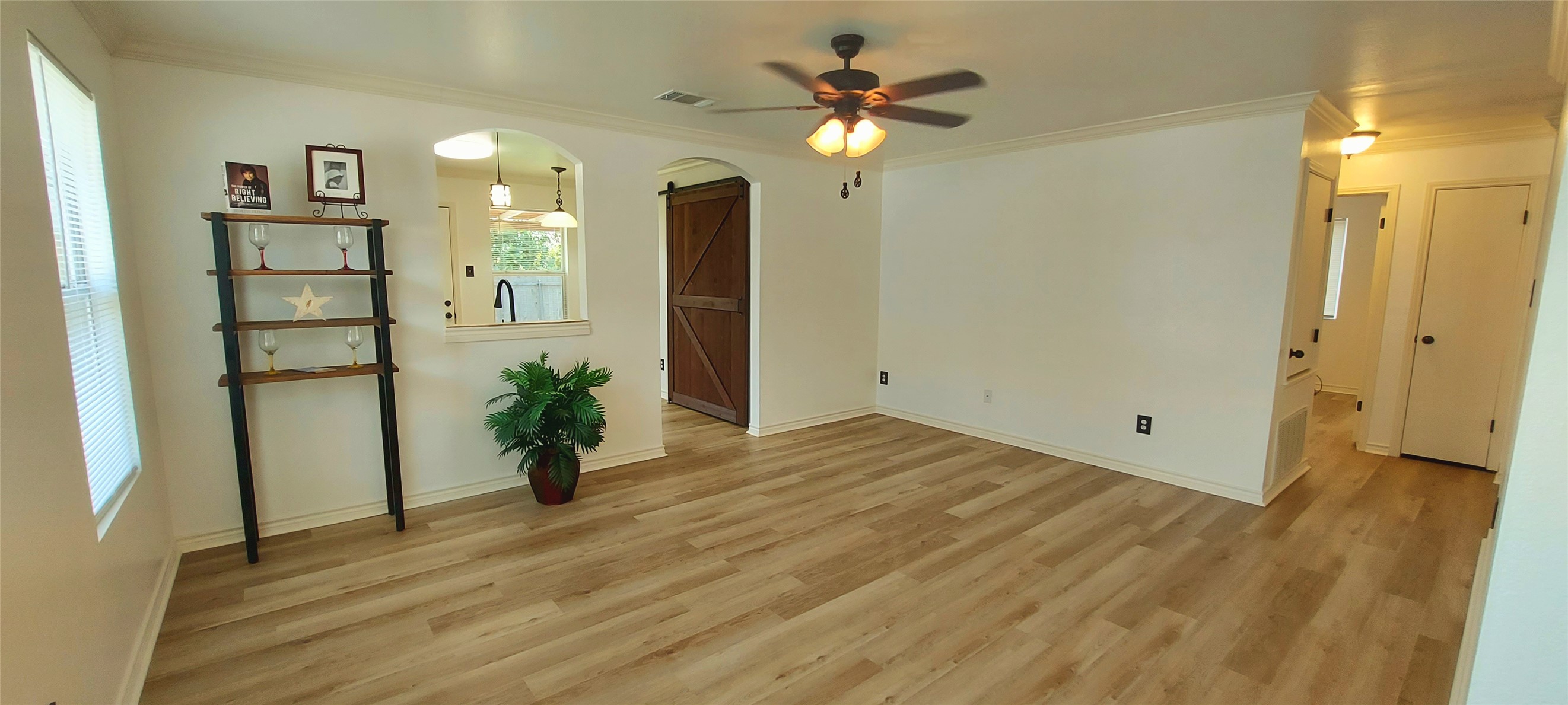 17609 Soapberry Cove Elgin, TX 78621 - Photo 13 of 38 a view of a livingroom with a flat screen tv