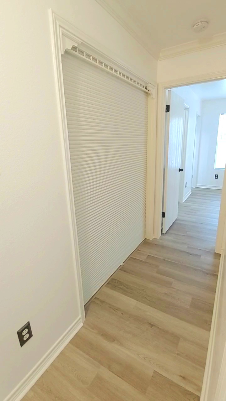 17609 Soapberry Cove Elgin, TX 78621 - Photo 15 of 38 a view of a room with wooden floor