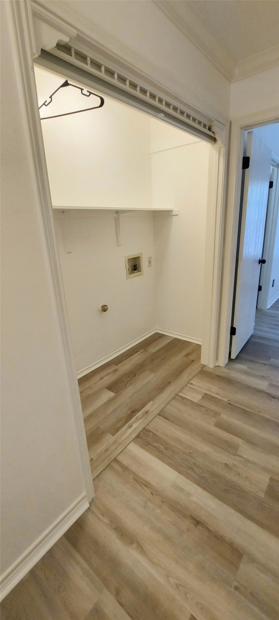 17609 Soapberry Cove Elgin, TX 78621 - Photo 16 of 38 a view of empty room with wooden floor