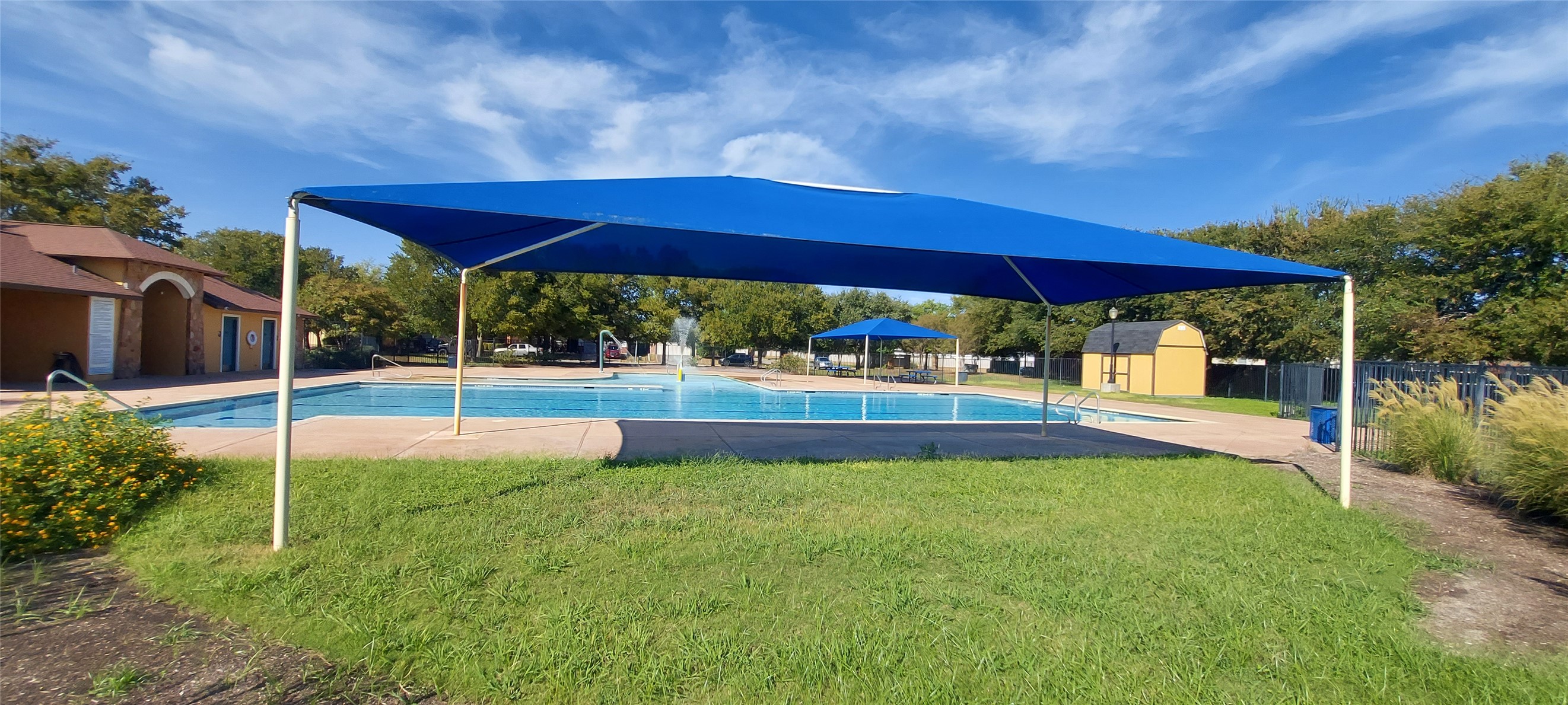 17609 Soapberry Cove Elgin, TX 78621 - Photo 37 of 38 a view of a house with swimming pool and sitting area