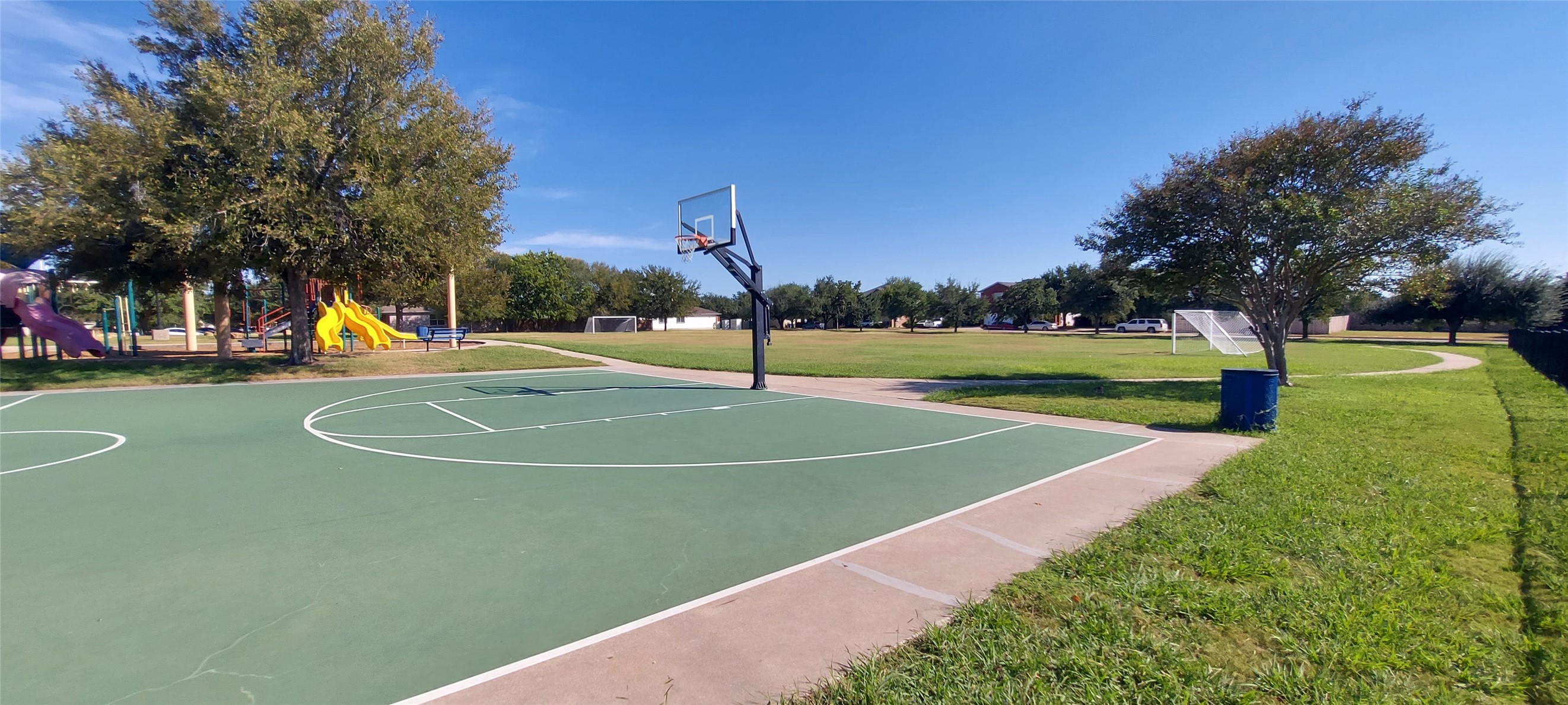 17609 Soapberry Cove Elgin, TX 78621 - Photo 38 of 38 a view of an outdoor space and tennis court