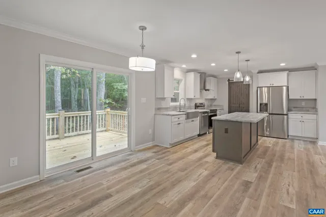 a bathroom with a granite countertop sink mirror and double