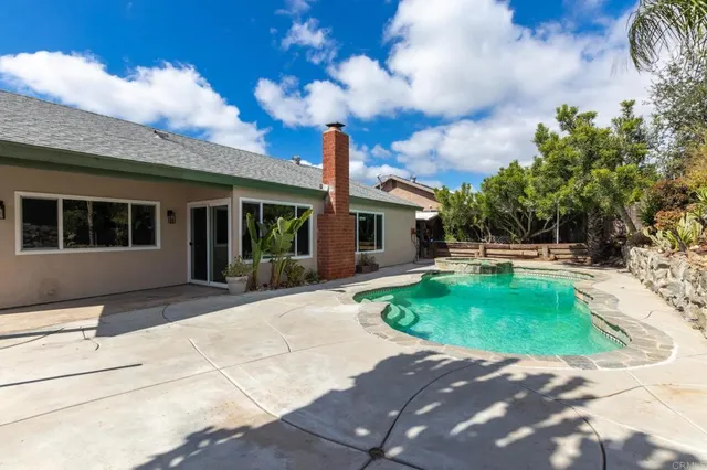 a front view of a house with yard