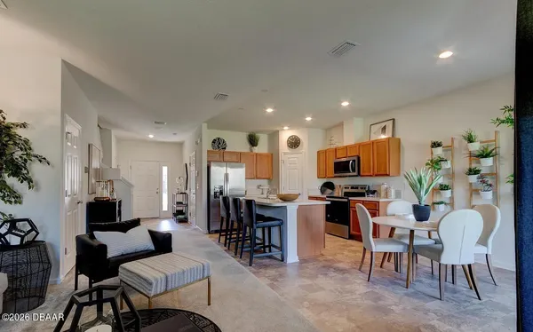 a view of a dining room with furniture