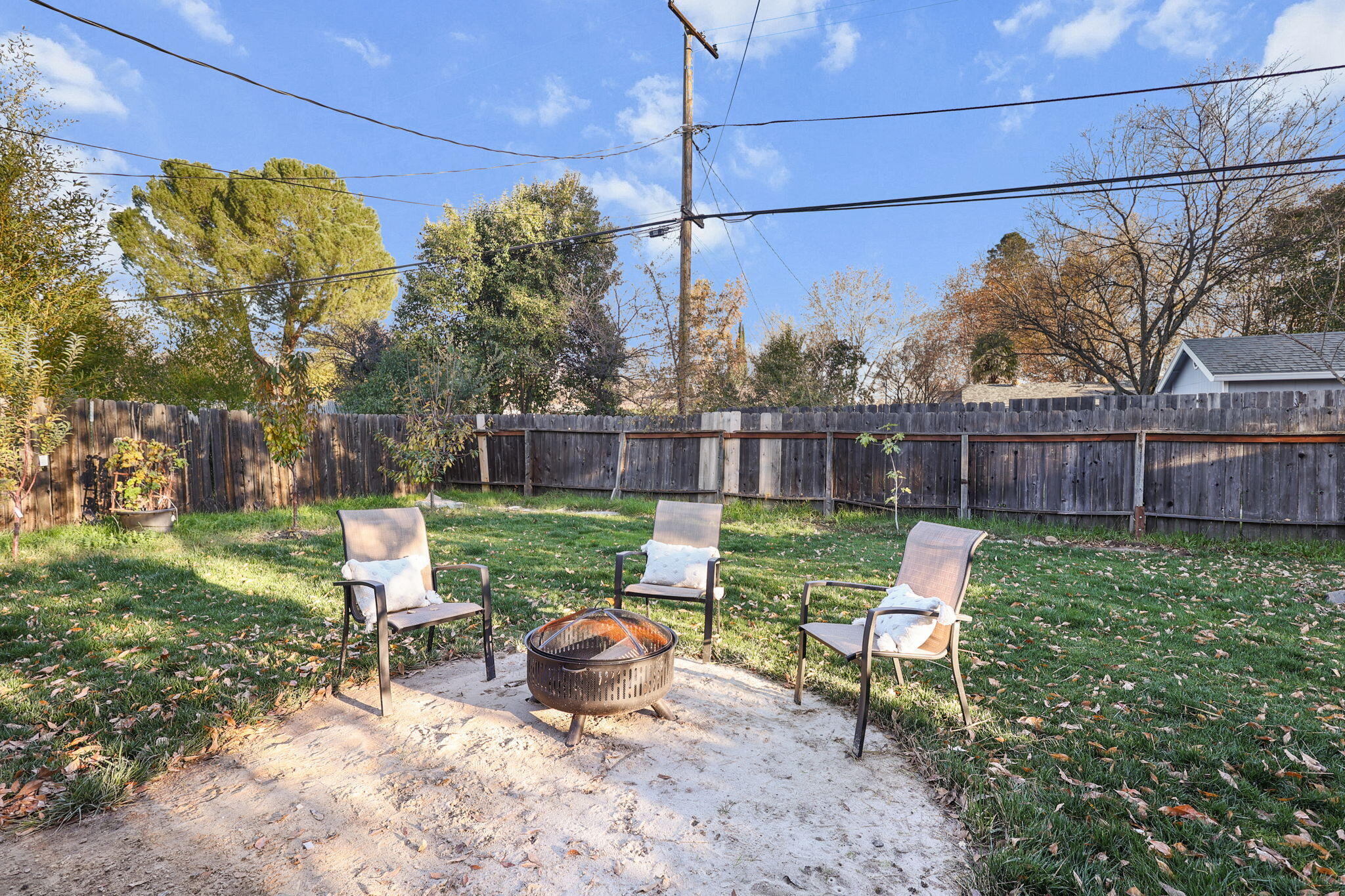 755 Christine Avenue Redding, CA 96003 - Photo 13 of 58 a view of a chairs in a backyard