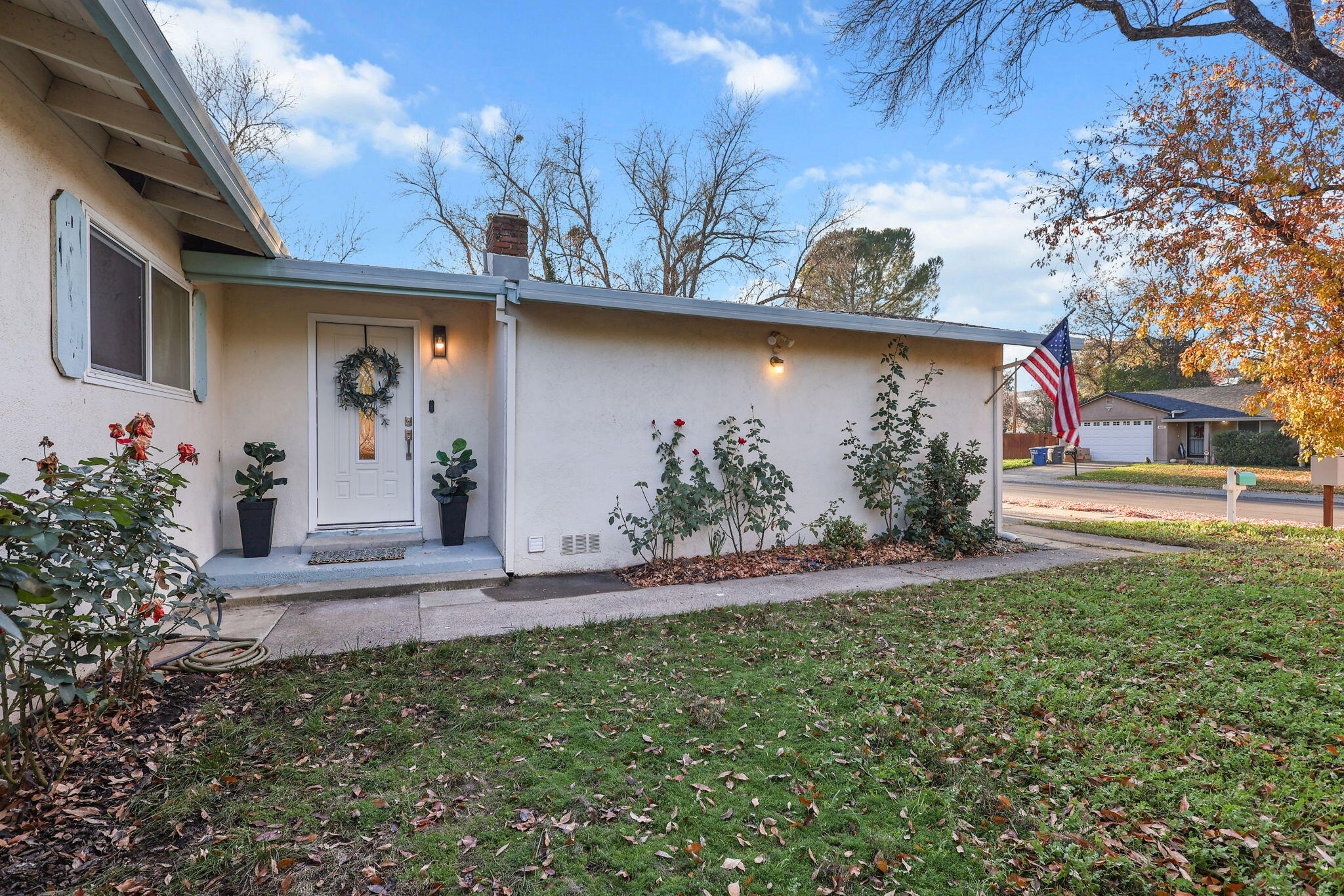 755 Christine Avenue Redding, CA 96003 - Photo 17 of 58 a front view of a house with garden