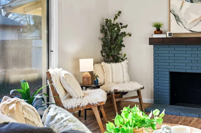 a dining room with furniture and wooden floor