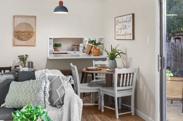 a kitchen with a stove and a sink