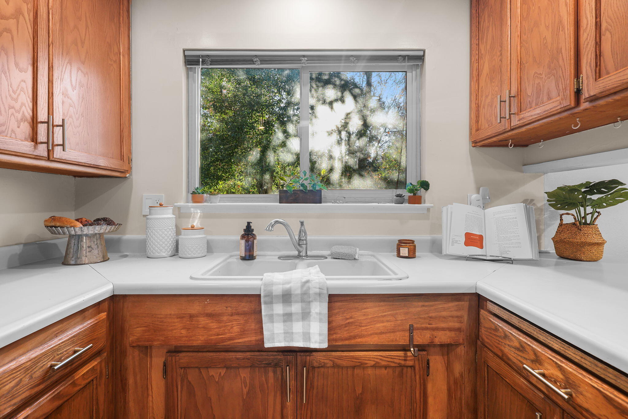 755 Christine Avenue Redding, CA 96003 - Photo 29 of 58 a kitchen with stainless steel appliances granite countertop a sink a stove and cabinets