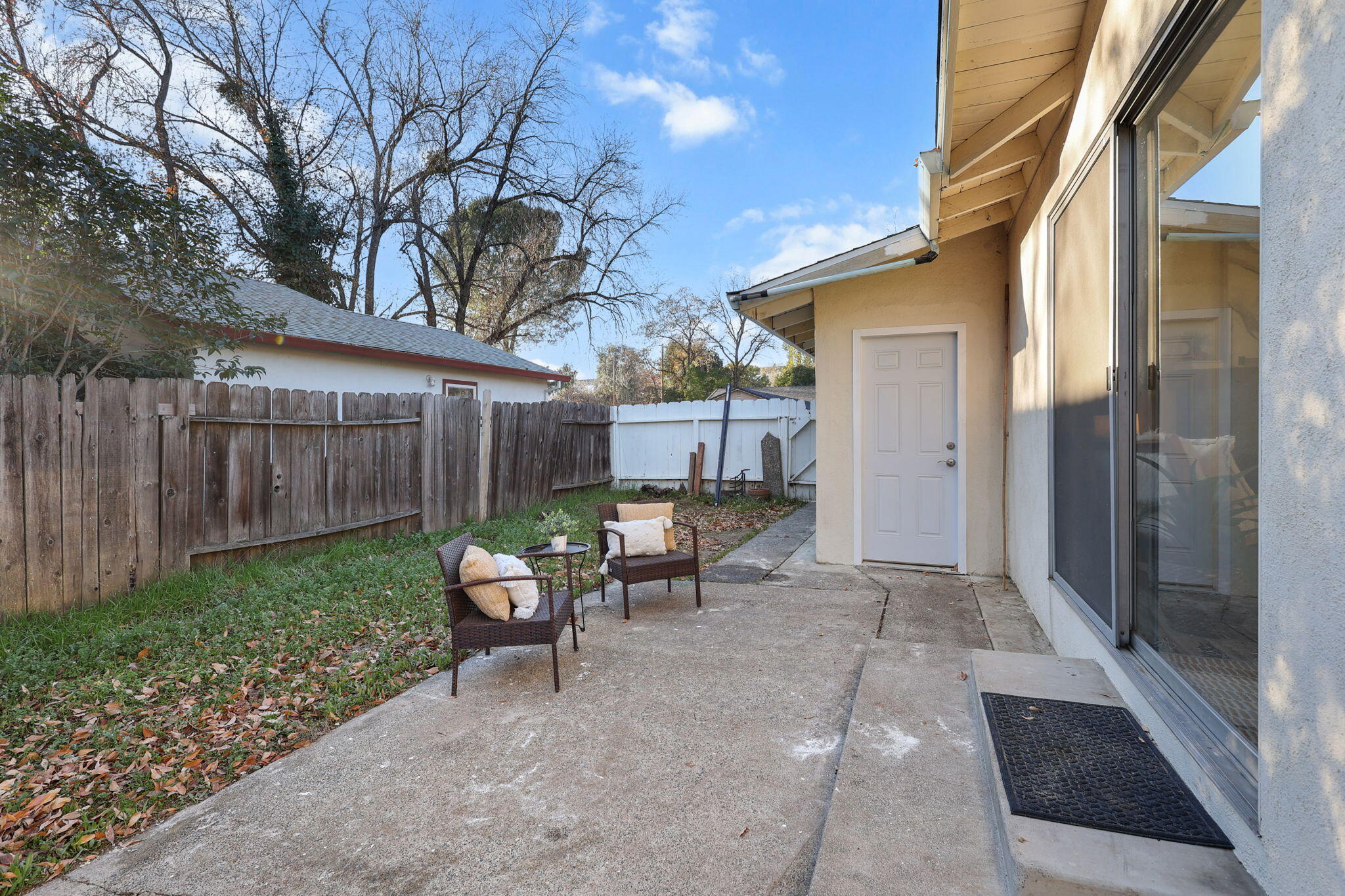 755 Christine Avenue Redding, CA 96003 - Photo 45 of 58 a view of a patio with a table and chairs