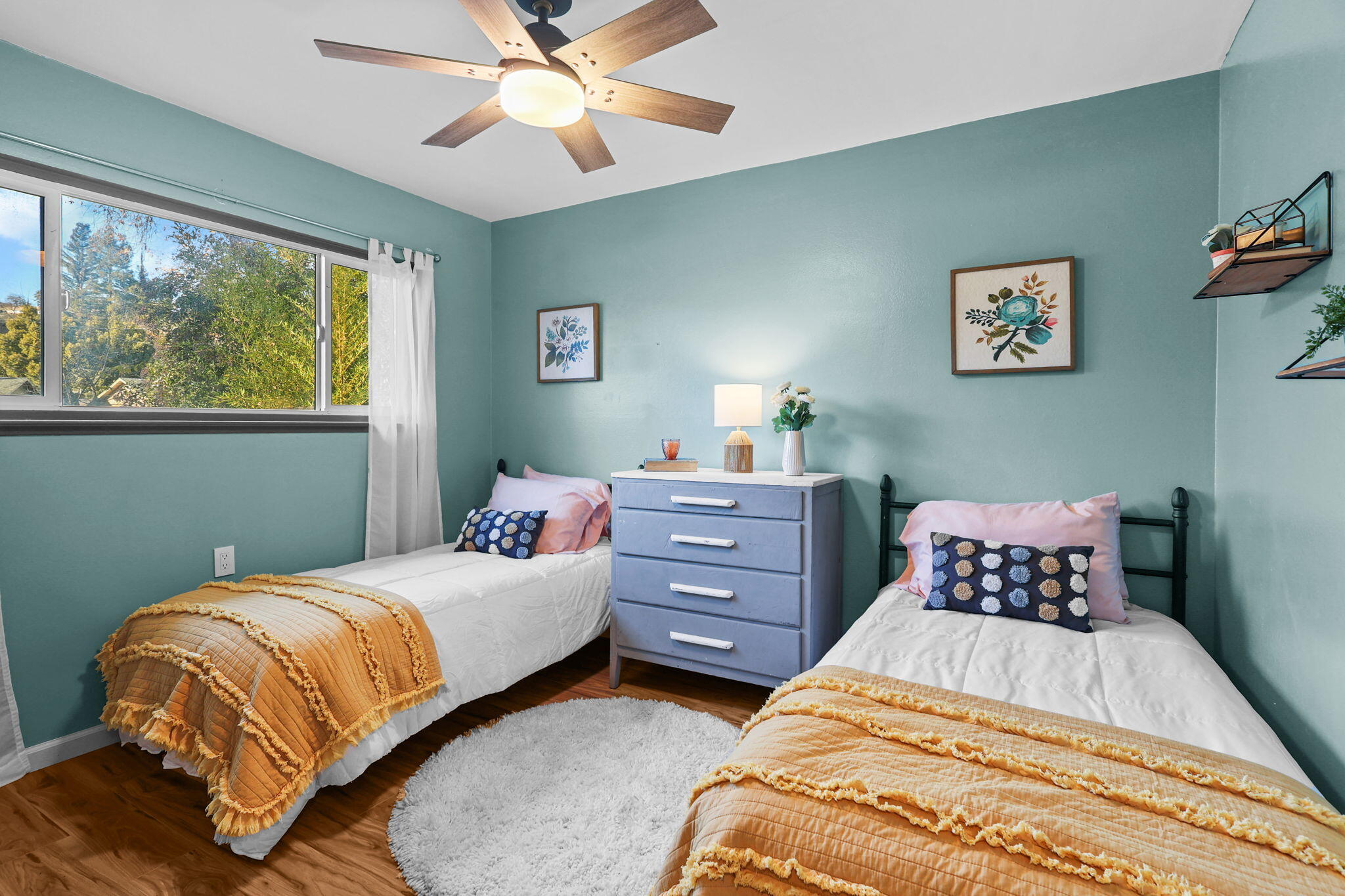 755 Christine Avenue Redding, CA 96003 - Photo 8 of 58 a bedroom with a bed and window