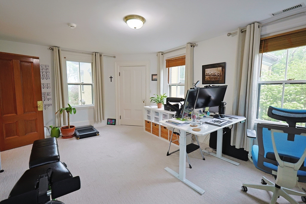 107 Waban Hill Road, Unit R Newton, MA 02467 - Photo 12 of 21 a view of a workspace with furniture and a window