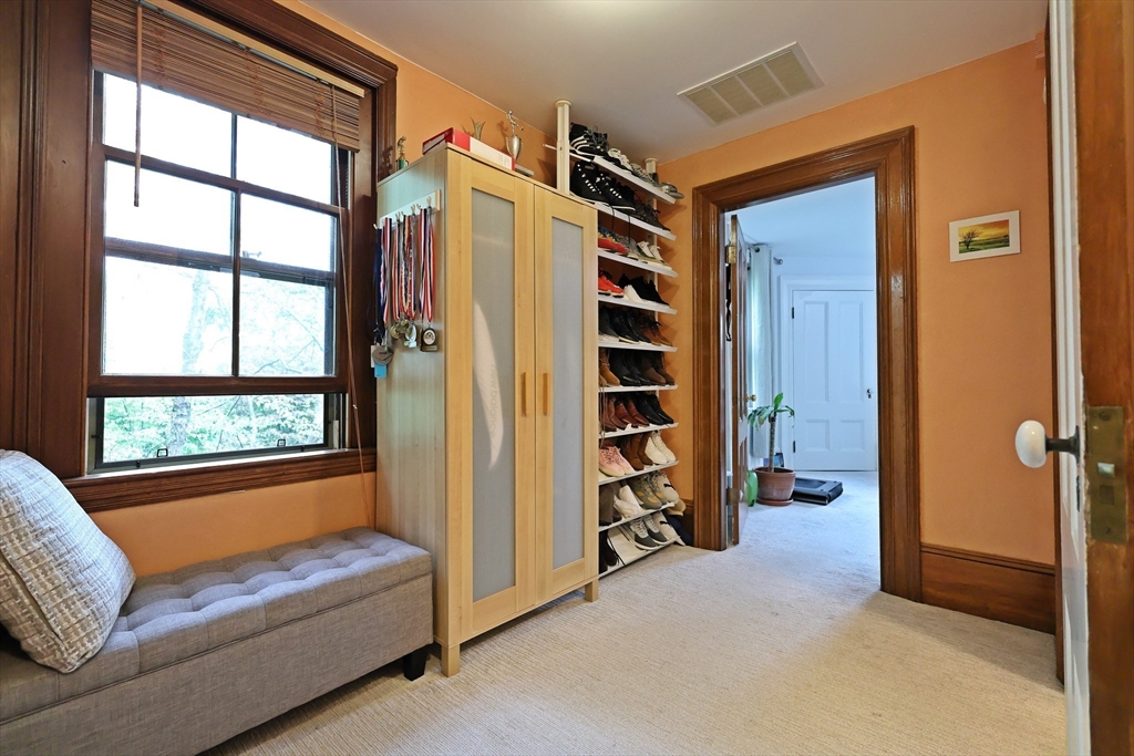 107 Waban Hill Road, Unit R Newton, MA 02467 - Photo 14 of 21 a living room with furniture and a window