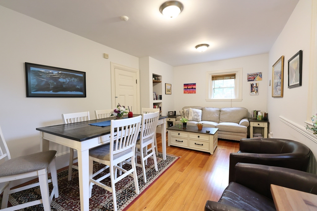 107 Waban Hill Road, Unit R Newton, MA 02467 - Photo 3 of 21 a view of a livingroom with furniture and wooden floor