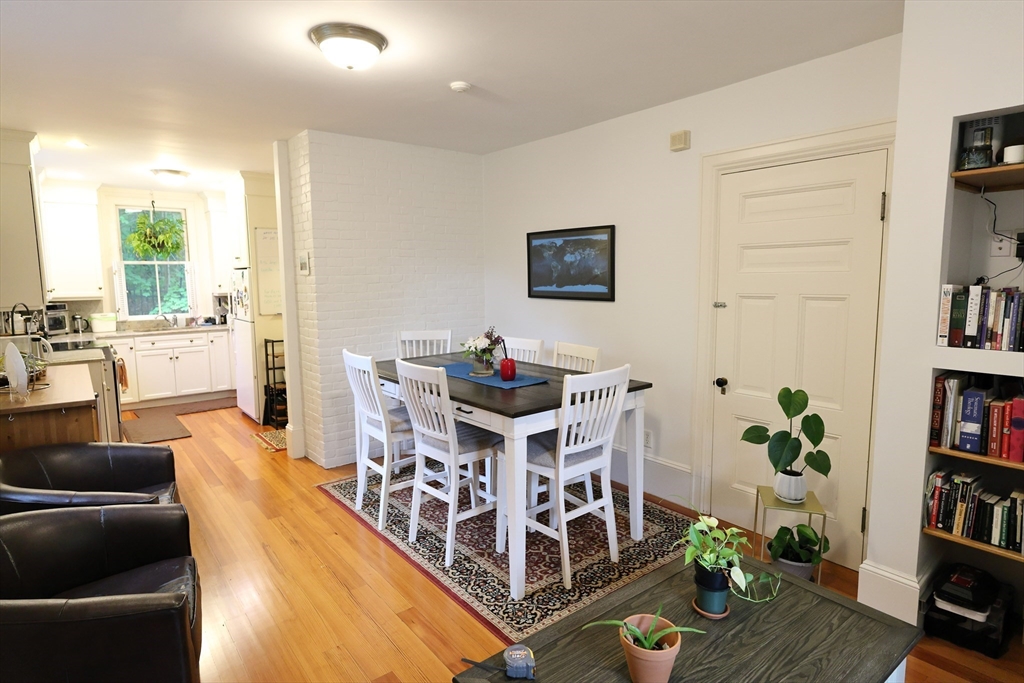 107 Waban Hill Road, Unit R Newton, MA 02467 - Photo 4 of 21 a living room with furniture and a book shelf
