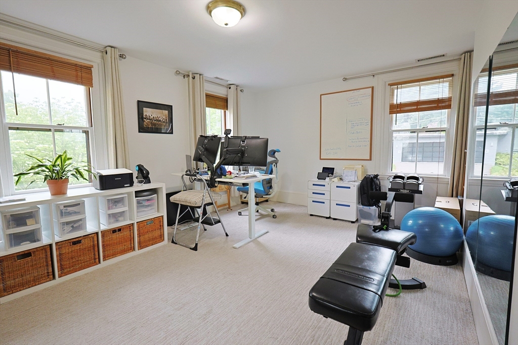 107 Waban Hill Road, Unit R Newton, MA 02467 - Photo 10 of 21 a view of a livingroom with workspace and a window