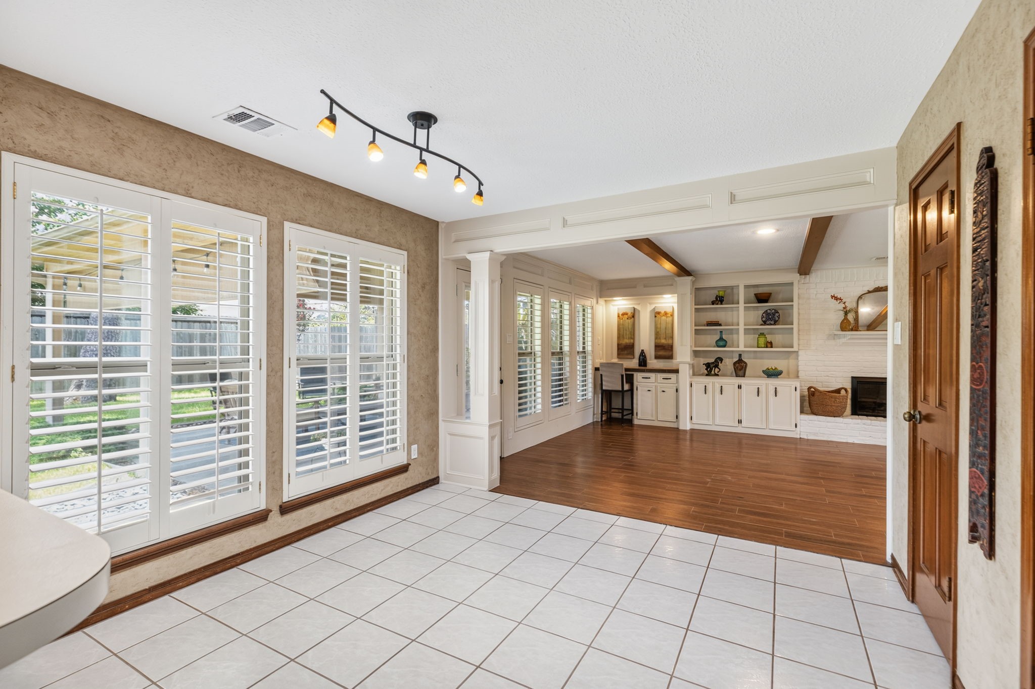 3414 Flaming Candle Drive Spring, TX 77388 - Photo 12 of 50 BREAKFAST ROOM - Breakfast room also has lovely views of the back yard & flows into the family room. Notice the Plantation Shutters on all of the windows.