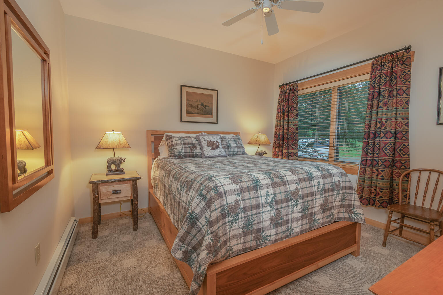 26 Whip Willow Farm Road, Unit 10 Rangeley, ME 04970 - Photo 13 of 35 First floor primary bedroom