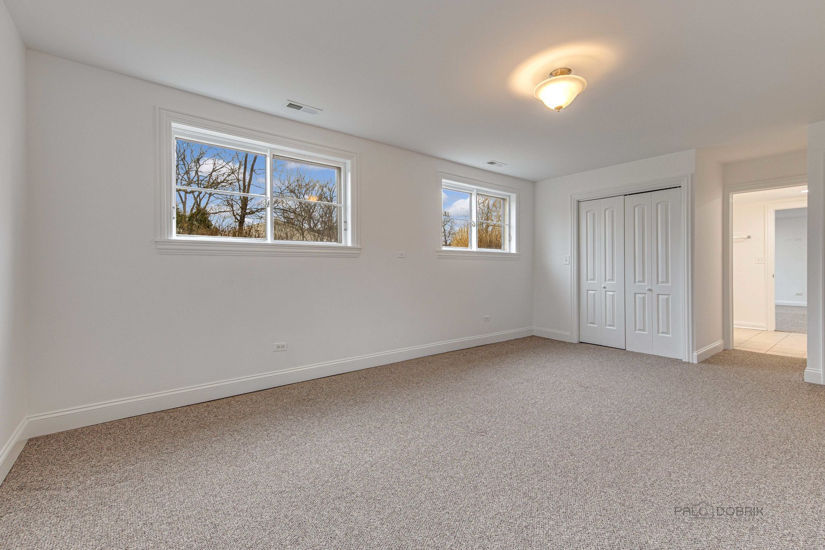 216 Green Bay Road Lake Bluff, IL 60044 - Photo 19 of 35 a view of an empty room with a window and closet area