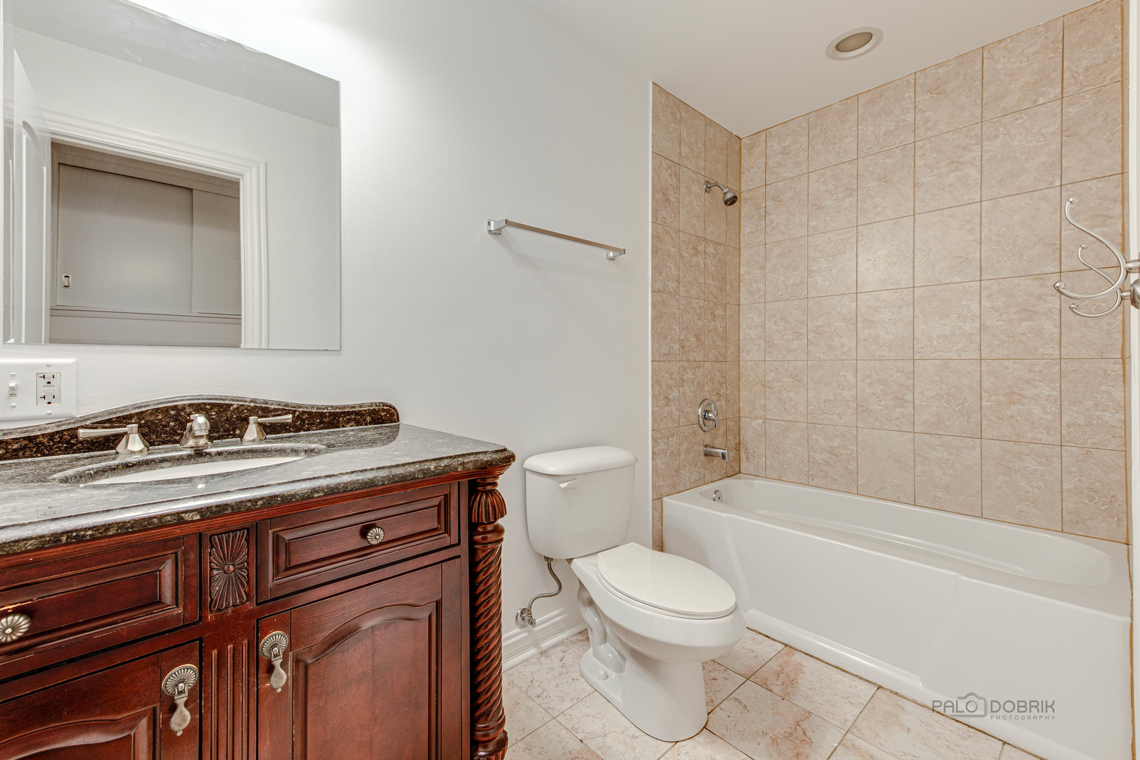 216 Green Bay Road Lake Bluff, IL 60044 - Photo 29 of 35 a bathroom with a granite countertop toilet a sink and bathtub