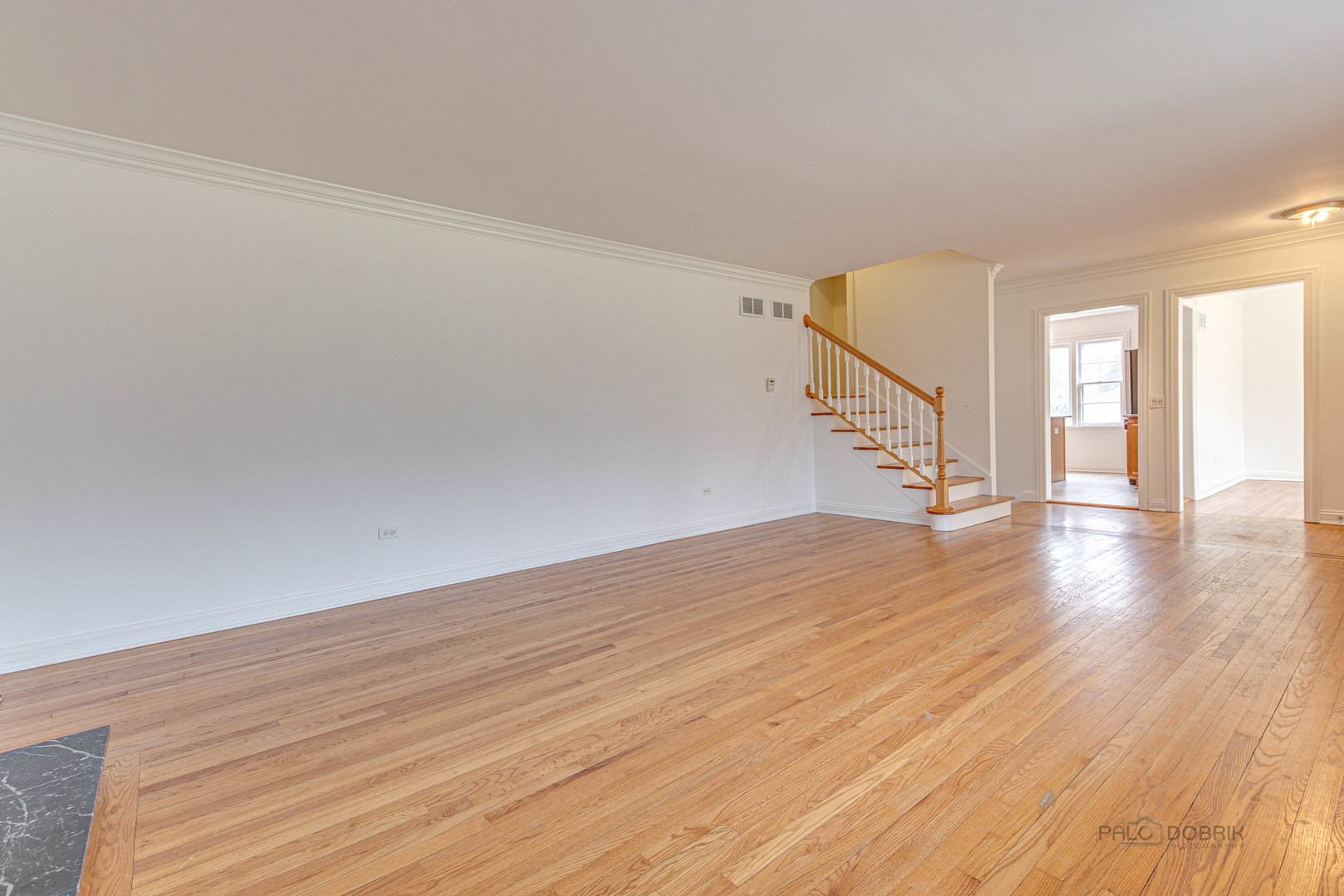 216 Green Bay Road Lake Bluff, IL 60044 - Photo 7 of 35 an empty room with wooden floor and windows