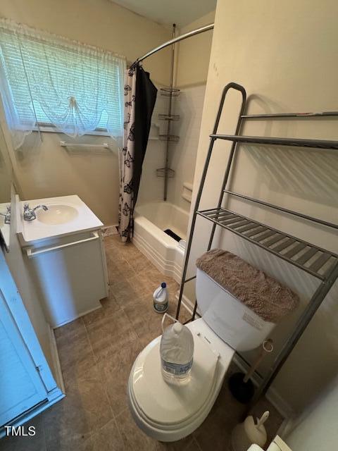 706 Orchard Drive Graham, NC 27253 - Photo 12 of 18 a room with water heater a washer and dryer