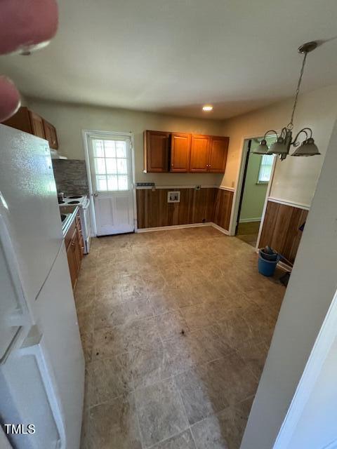 706 Orchard Drive Graham, NC 27253 - Photo 6 of 18 a view of a livingroom with furniture and a flat screen tv