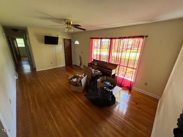 706 Orchard Drive Graham, NC 27253 - Photo 9 of 18 a living room with furniture and a flat screen tv