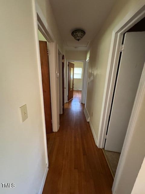 706 Orchard Drive Graham, NC 27253 - Photo 10 of 18 a view of a hallway with wooden floor