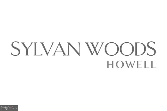 a kitchen with a sink stove and microwave