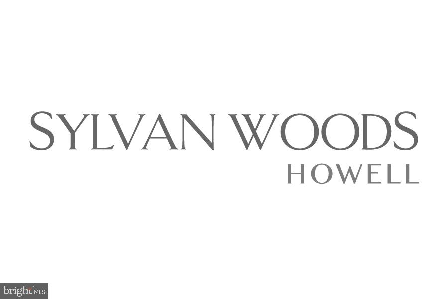 6461 Highway 9, Unit 142 Howell, NJ 07731 - Photo 9 of 29 a street sign that is on a white wall