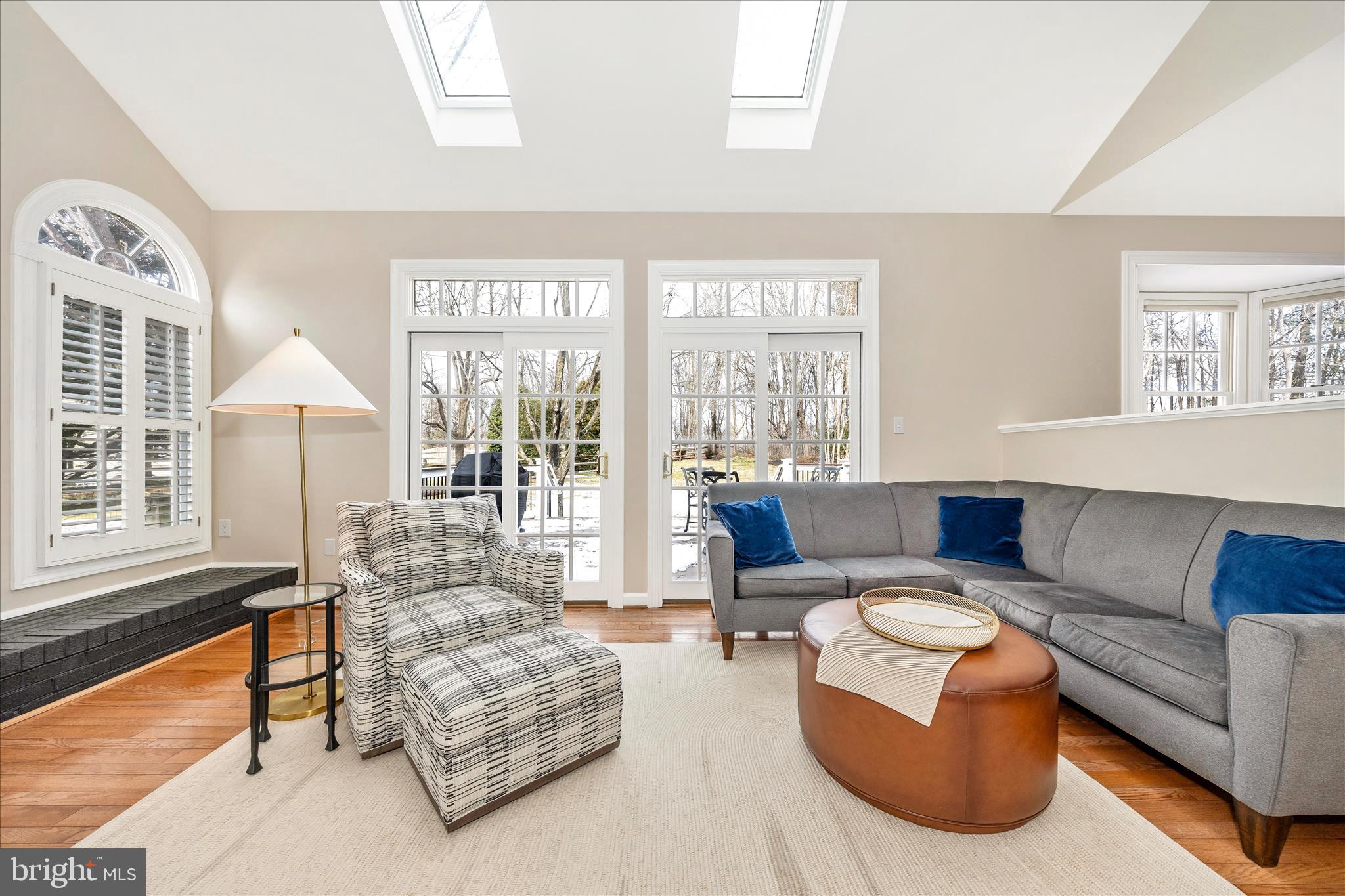 6135 Cornwall Place Frederick, MD 21701 - Photo 22 of 81 a living room with furniture and a large window