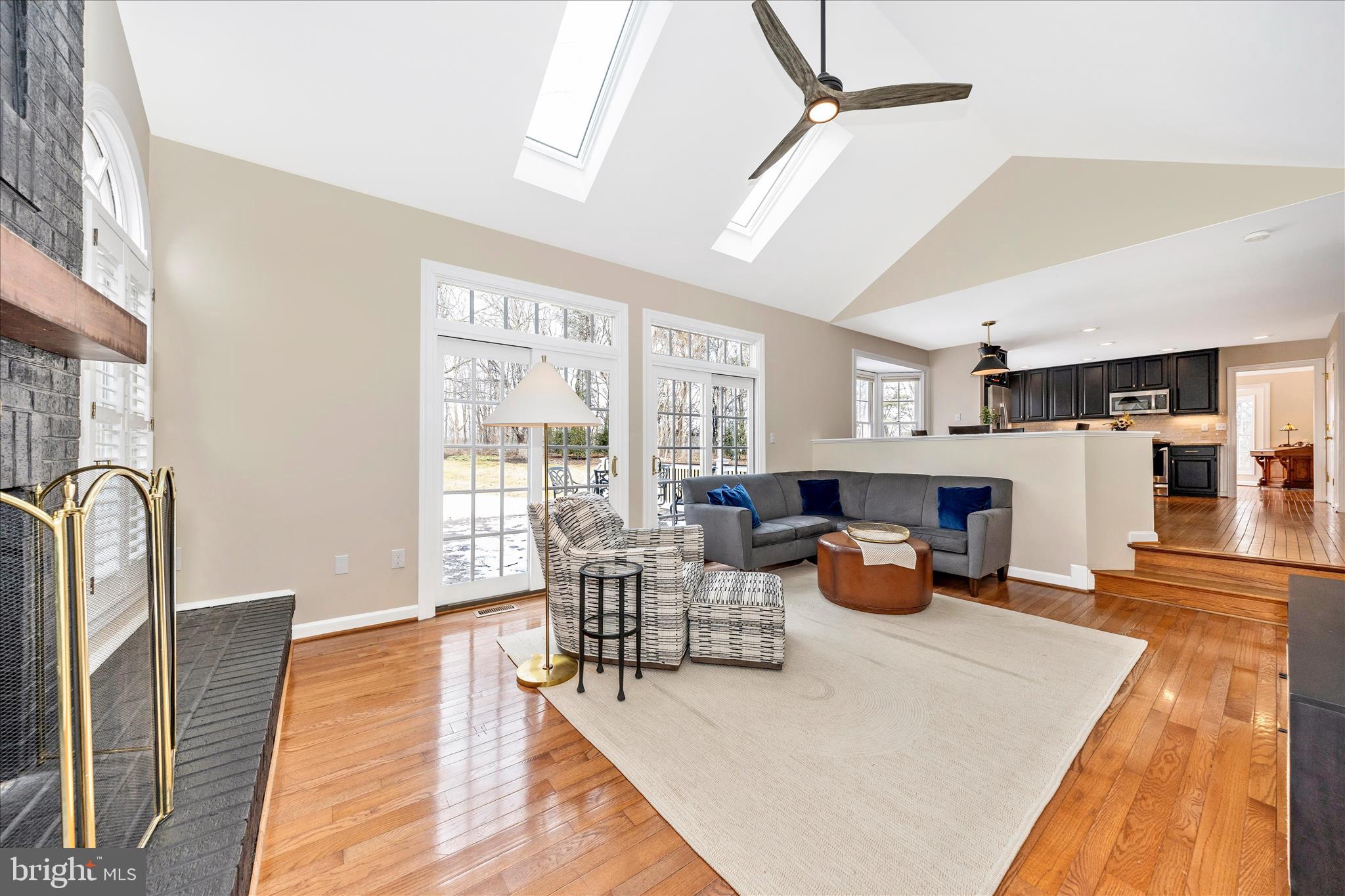 6135 Cornwall Place Frederick, MD 21701 - Photo 23 of 81 a living room with furniture and wooden floor