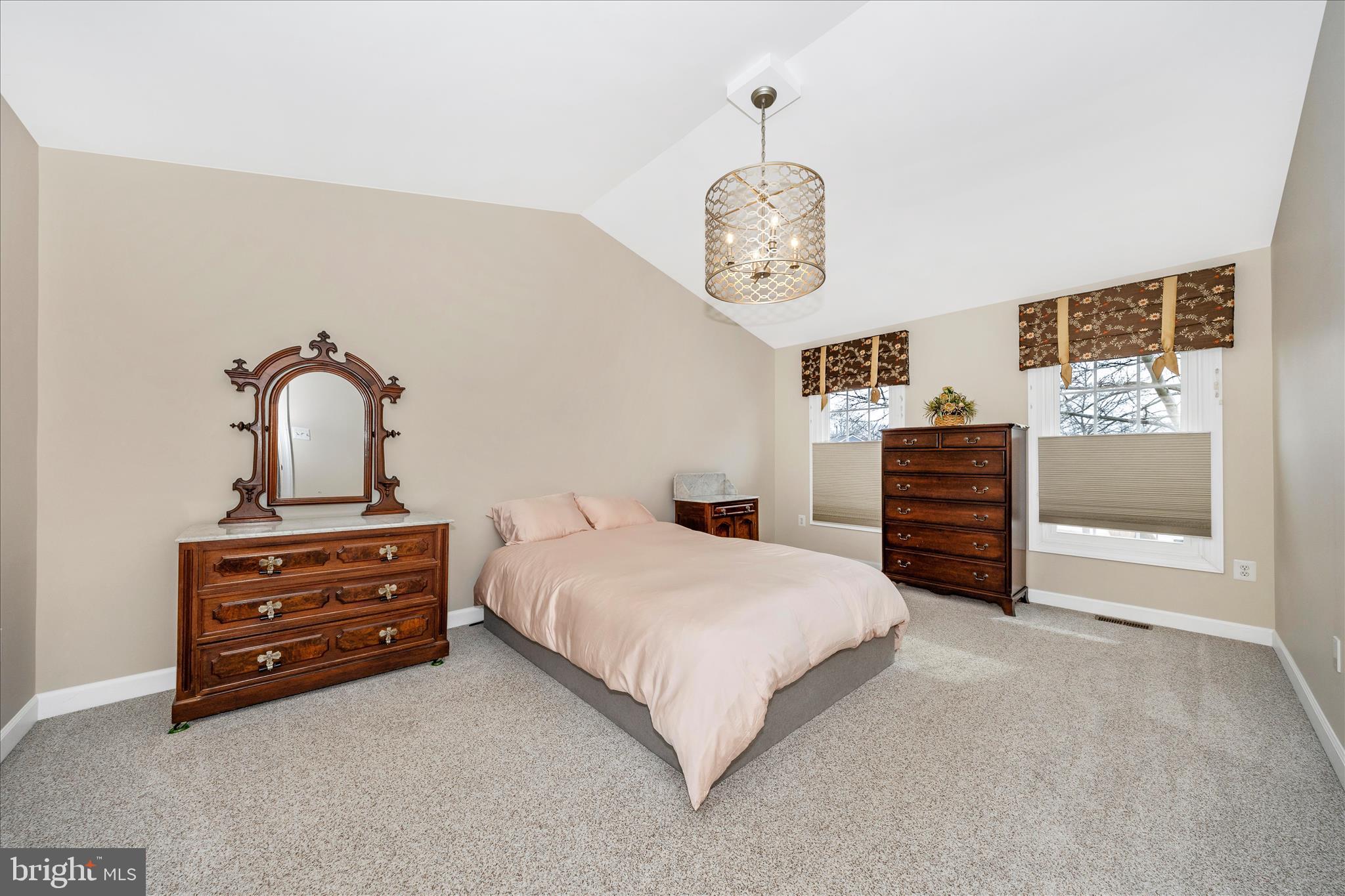 6135 Cornwall Place Frederick, MD 21701 - Photo 30 of 81 a bedroom with a bed and dresser