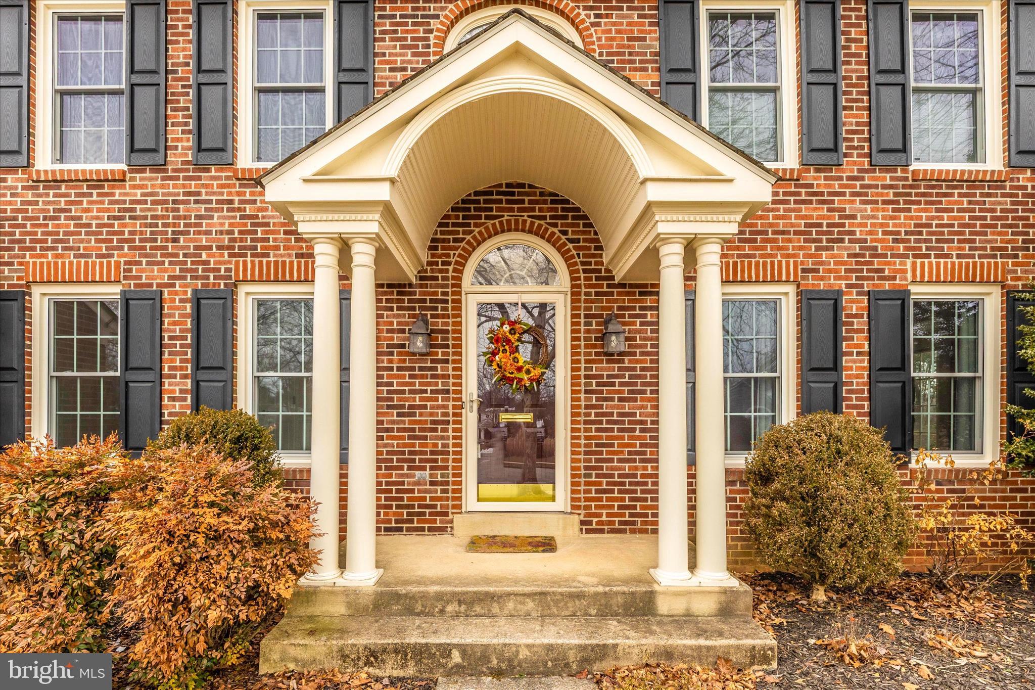 6135 Cornwall Place Frederick, MD 21701 - Photo 3 of 81 a view of a brick house with large windows