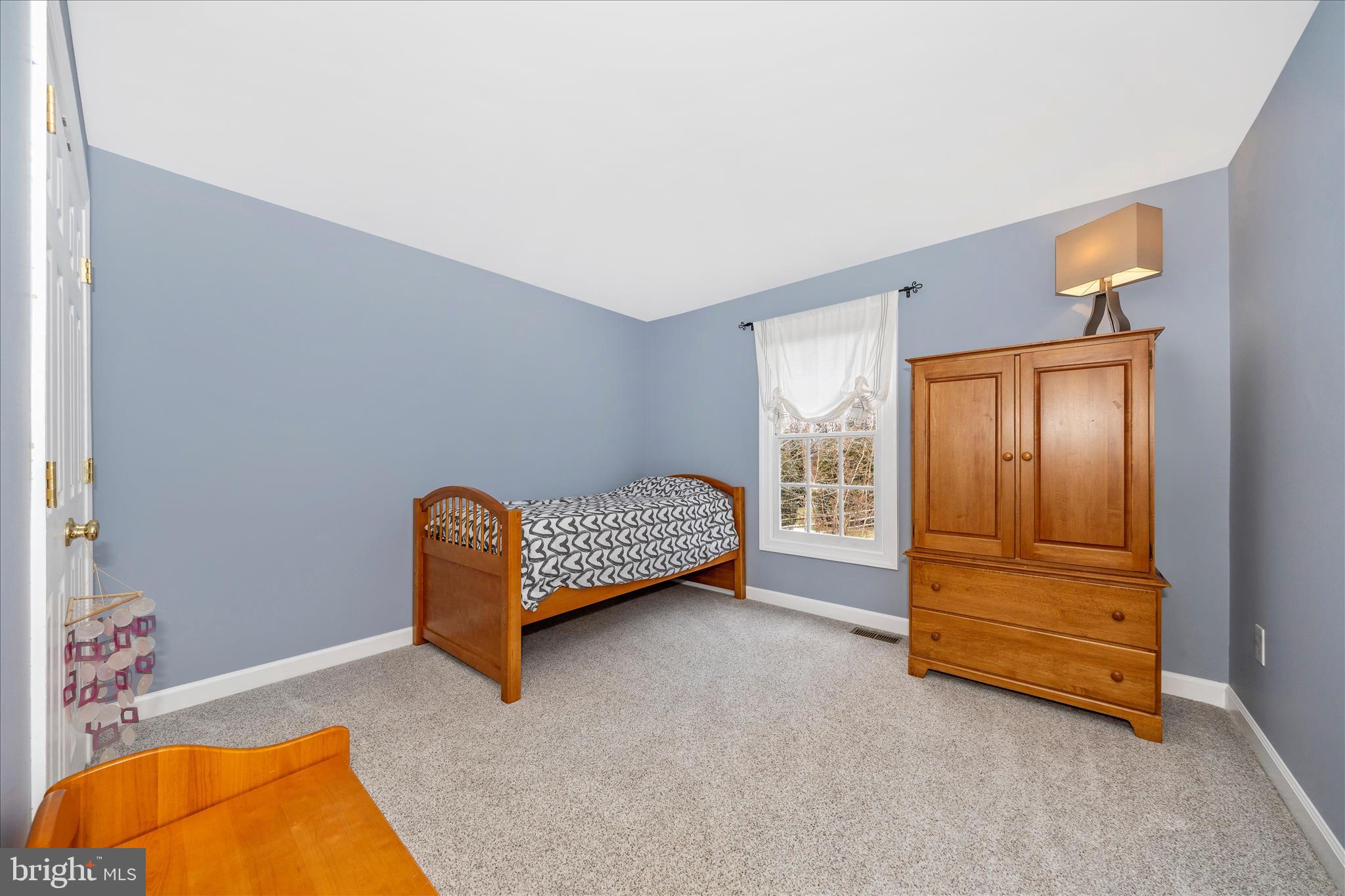 6135 Cornwall Place Frederick, MD 21701 - Photo 37 of 81 a bedroom with a bed and cabinet