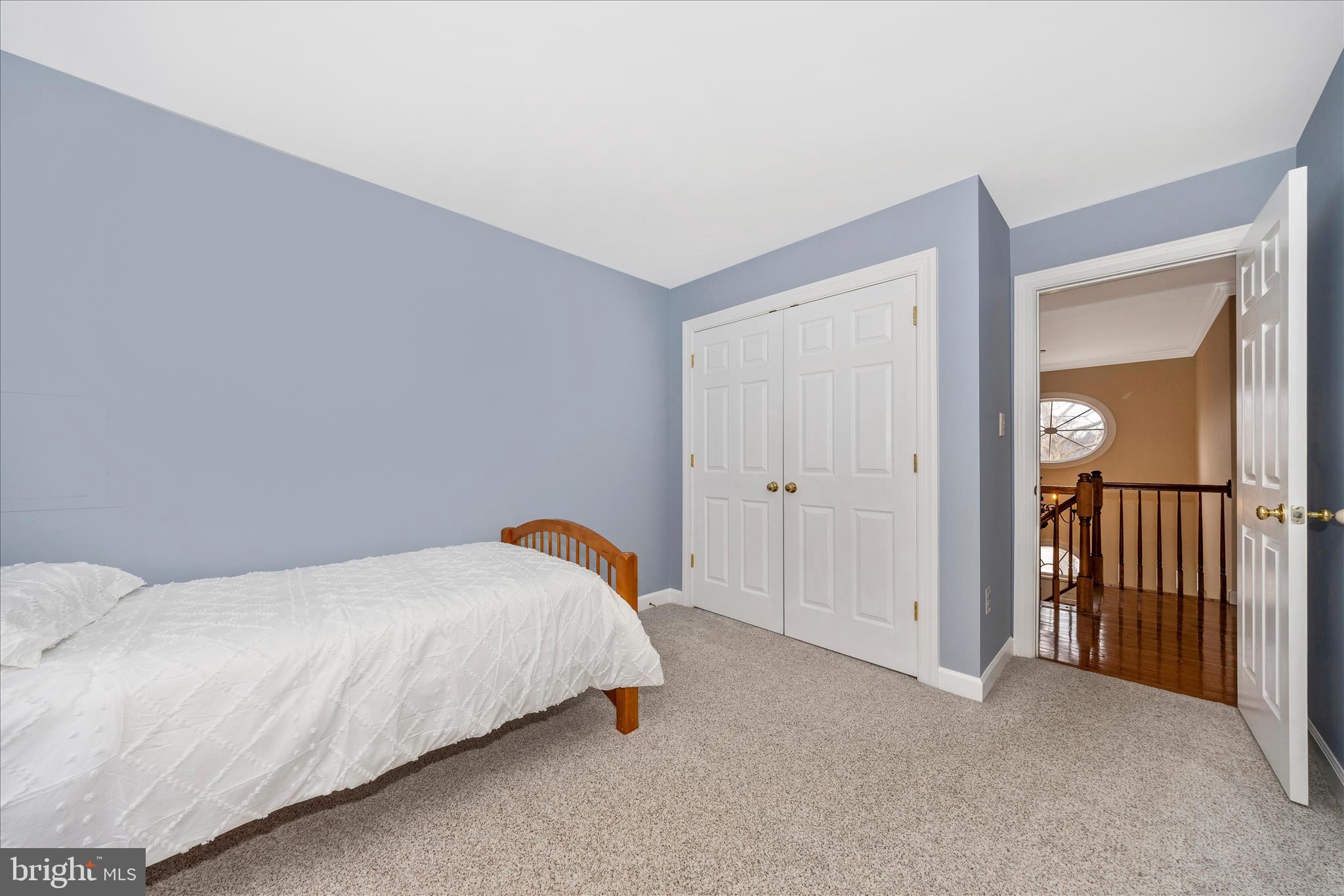 6135 Cornwall Place Frederick, MD 21701 - Photo 40 of 81 a bedroom with a bed and closet
