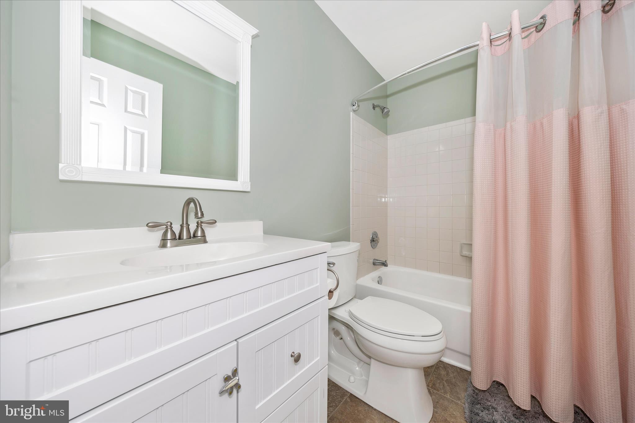 6135 Cornwall Place Frederick, MD 21701 - Photo 41 of 81 a bathroom with a sink a toilet and shower