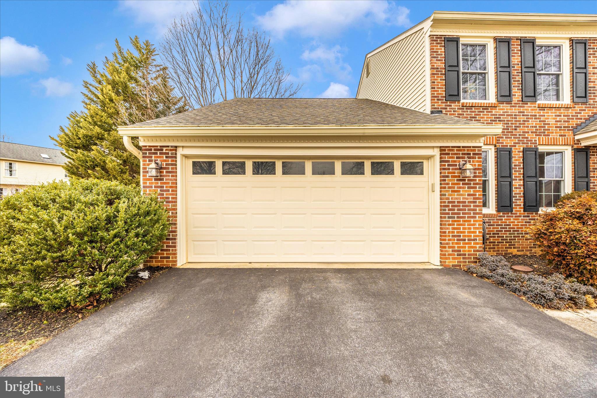 6135 Cornwall Place Frederick, MD 21701 - Photo 51 of 81 a front view of a house with a garden