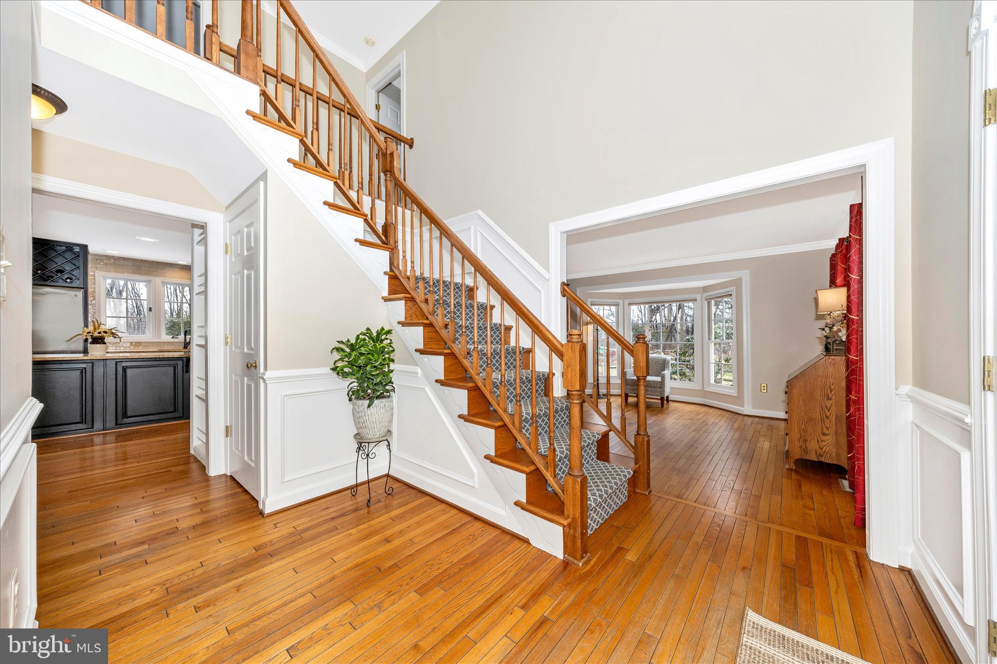 6135 Cornwall Place Frederick, MD 21701 - Photo 6 of 81 a view of entryway and hall with wooden floor