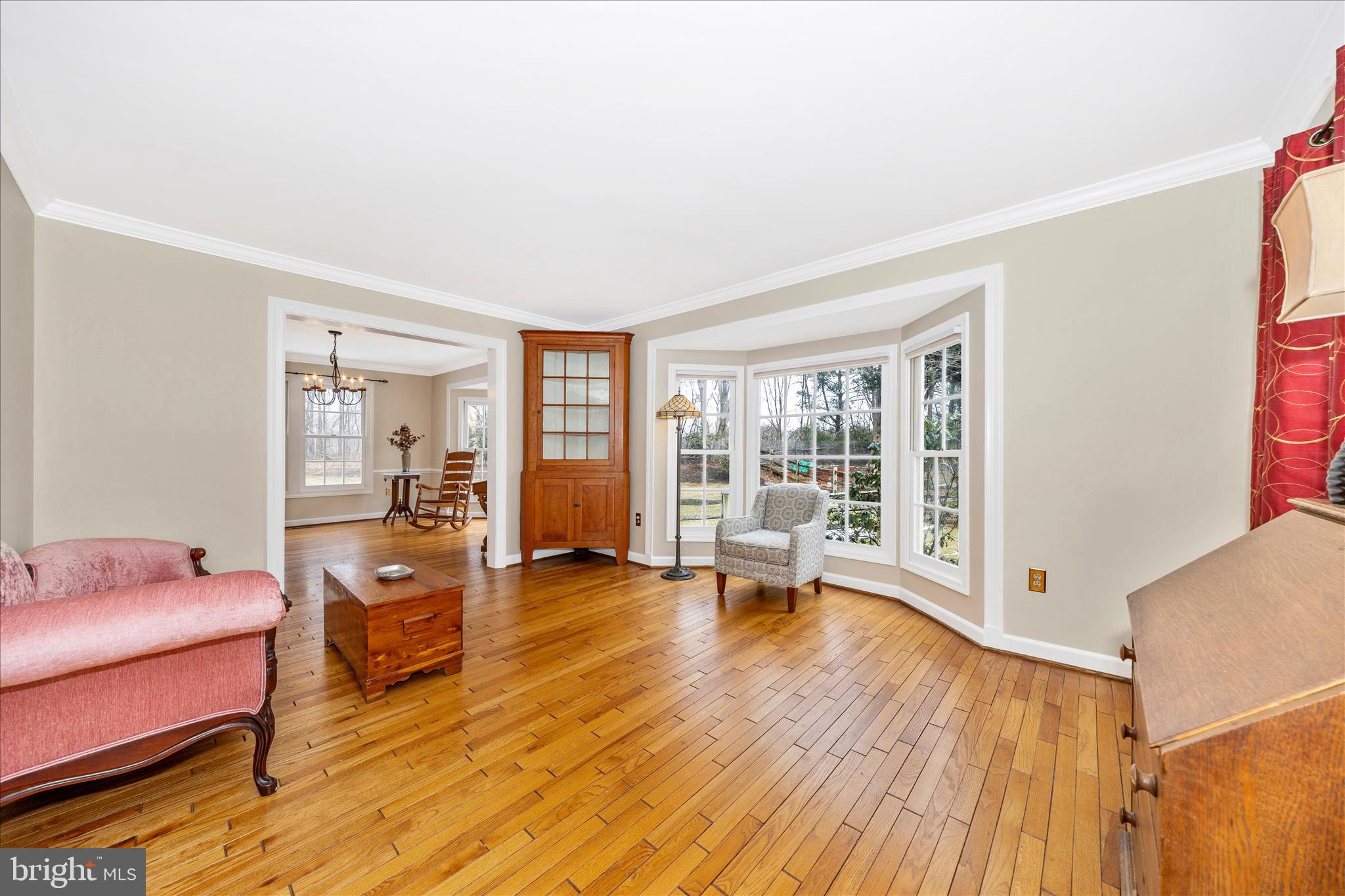 6135 Cornwall Place Frederick, MD 21701 - Photo 7 of 81 a living room with furniture and wooden floor