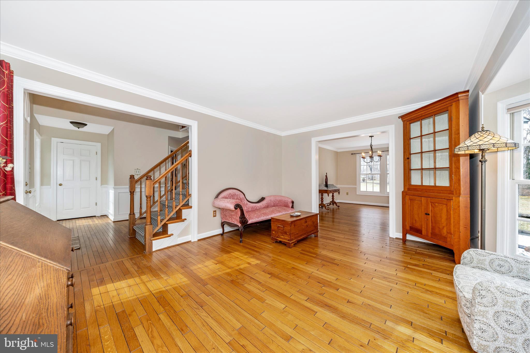 6135 Cornwall Place Frederick, MD 21701 - Photo 9 of 81 a living room with furniture and a wooden floor