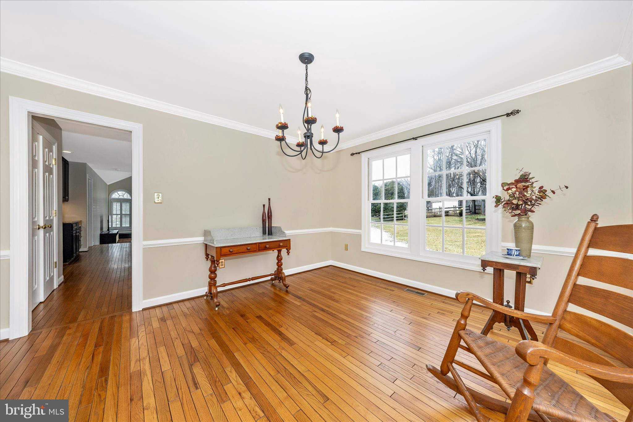 6135 Cornwall Place Frederick, MD 21701 - Photo 10 of 81 a living room with furniture and a wooden floor